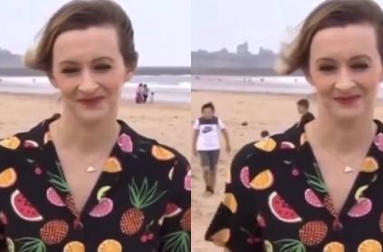 england news anchor upstaged by boy dancing behind her