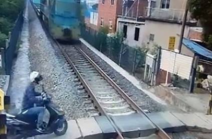 freight train ploughs into a scooter rider, he escapes in china