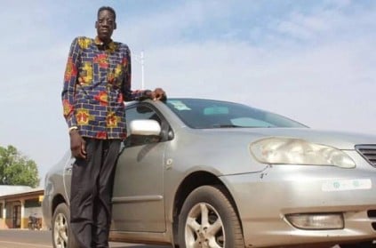 Ghana man tall guy grow frequently by medical condition