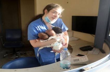 lebanon photo of nurse with 3 babies gone viral makes emotional