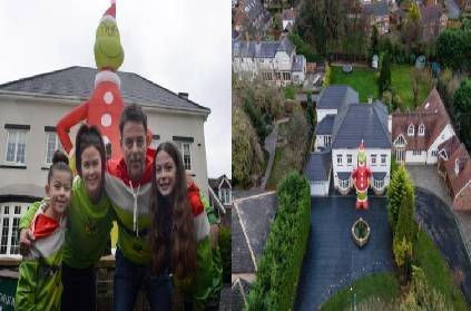 man accidentally order inflatable grinch taller than house england