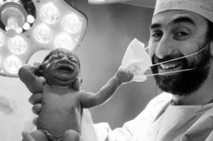 Newborn baby pulls doctor’s face mask in Dubai