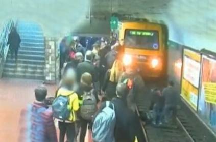 passenger reused woman who fell down in train track