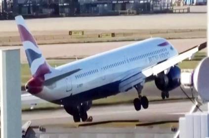 Plane forced to abort landing at windy Heathrow airport