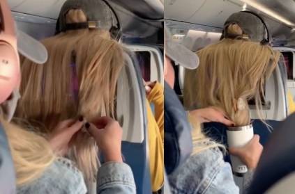 plane passenger sticks chewing gum into womans hair