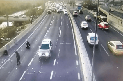 Robbers make money rain down on the highway in Chile