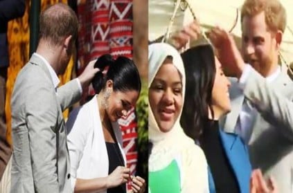 Sweet Video Of Prince Harry Fixing Meghans Hair Goes Viral