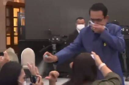 Thai PM sprays sanitizer on journalists to avoid questions