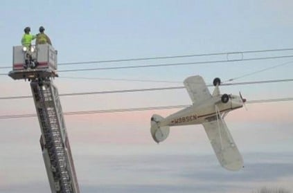 US Pilot Is Rescued After Plane Gets Tangled In Power Lines