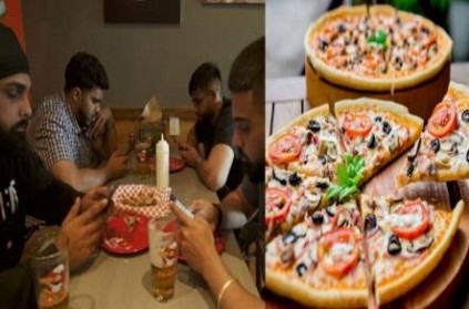 US restaurant offers free pizzas to diners who put away their phones