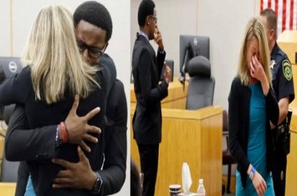Watch Video US killer cop hugged by victims brother in court