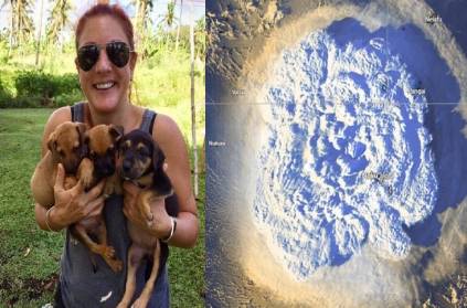 Woman save her dog during a Tonga volcanic eruption