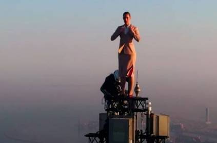 Woman stands on top of Burj Khalifa in viral Emirates ad.