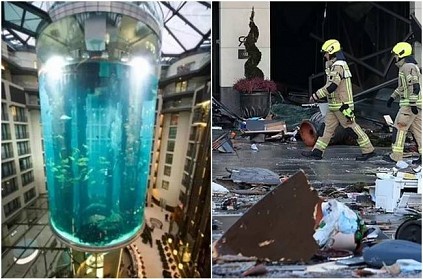 world largest freestanding cylindrical aquarium burst in Berlin