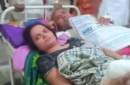 Man Woman forced to share stretcher in MP Govt Hospital