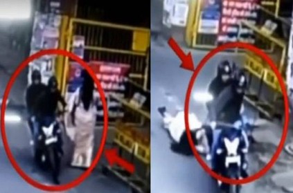 Two bike snatchers dragging a woman on the road, Caught on CCTV