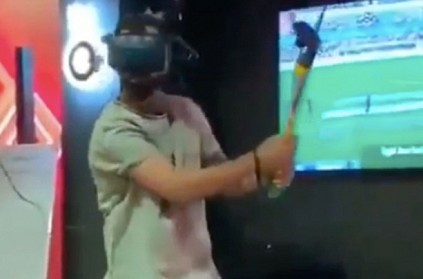 virat kholi\'s wife gives tips while he plays virtual reality cricket