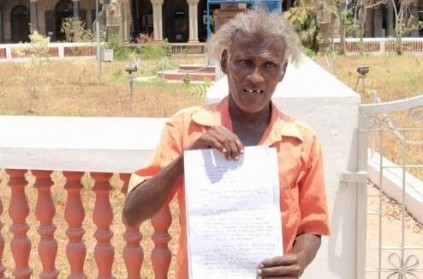 old man gives petition to collector regarding vote rights