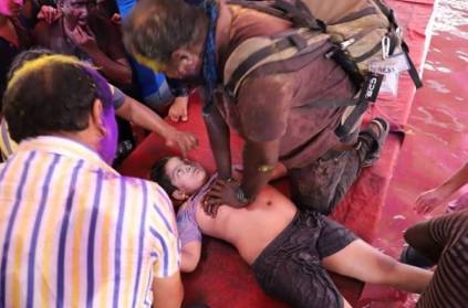 Photo Journalist Reuters Ravi Saves a boy during holi festival Chennai