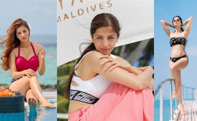 actress vedhika hot bikini pictures from Maldives beach