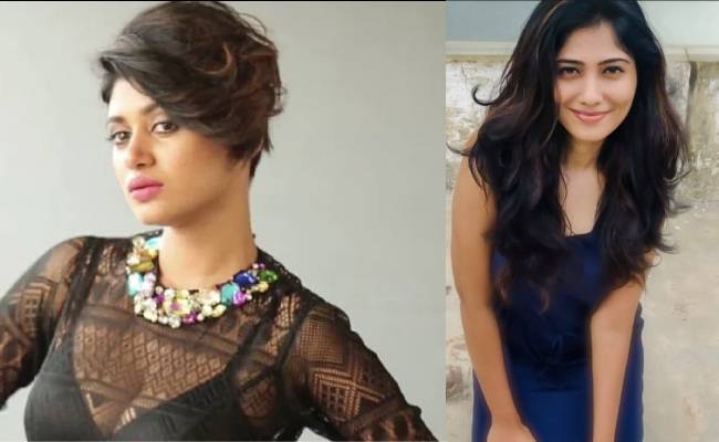 Bigg Boss fame Oviya and Julie hugs each other on stage