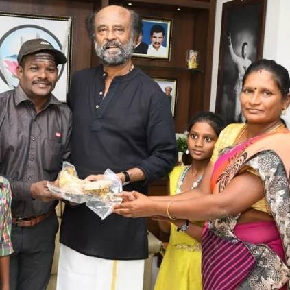 Superstar Rajinikanth gives house key to Gaja cyclone victims