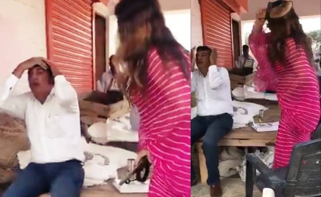 Tiktok fame Sonali Phogat beating man with slipper Video goes Viral | டிக்டாக் பிரபலம் அதிகாரியை செருப்பால் அடிக்கும் வீடியோ வைரல்